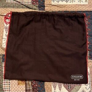 Brown/ red Coach dust bag
